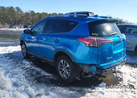 2016 Toyota Rav4 Hybrid Xle z USA, uszkodzony, nr VIN JTMRJREVXGD035175